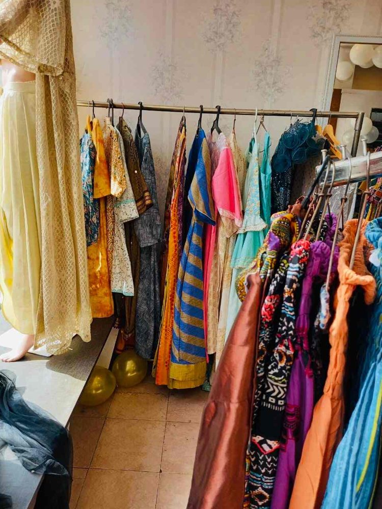 Racks of readymade suits at the Vastravan studio